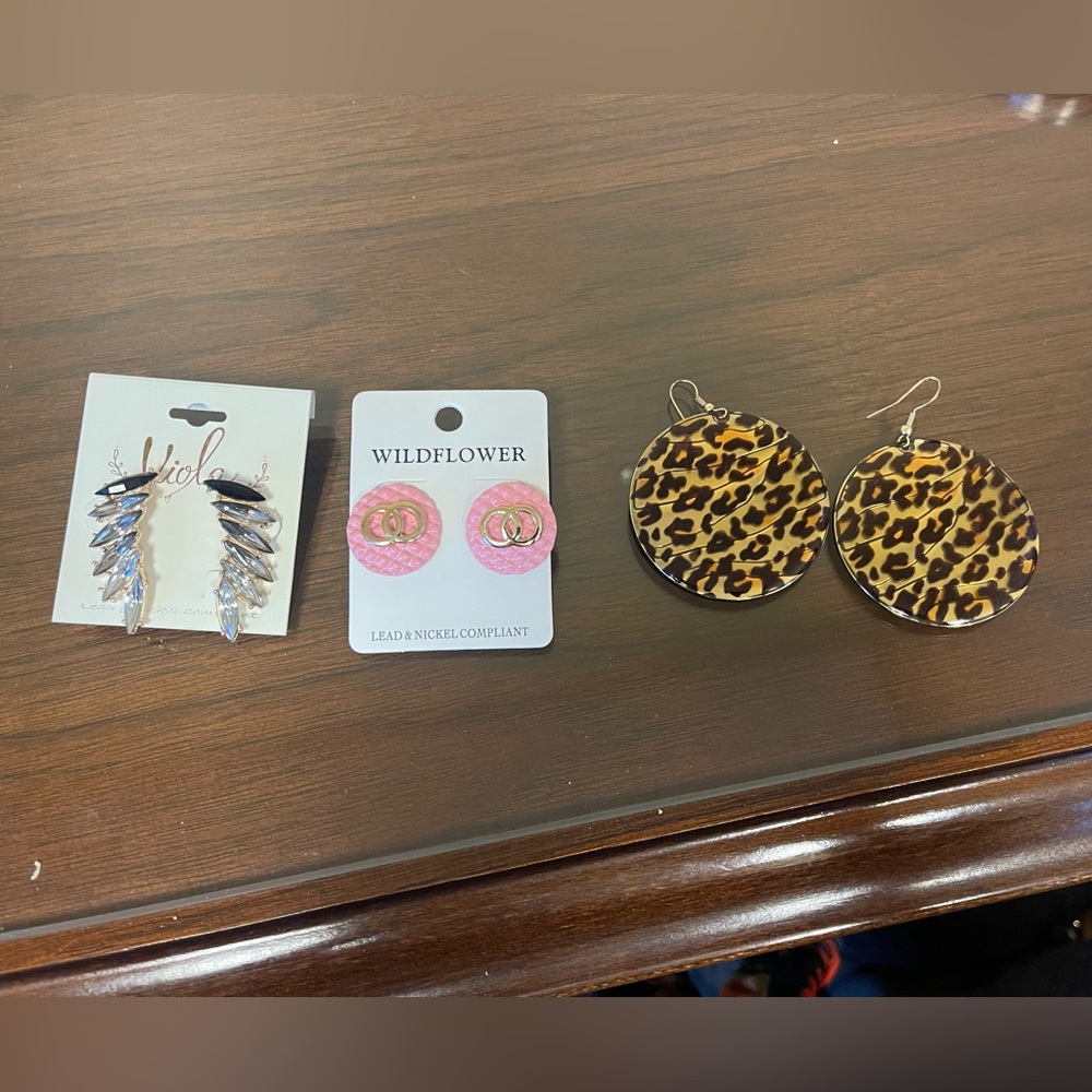 3 Pair of Earrings. 2 are new still on holder